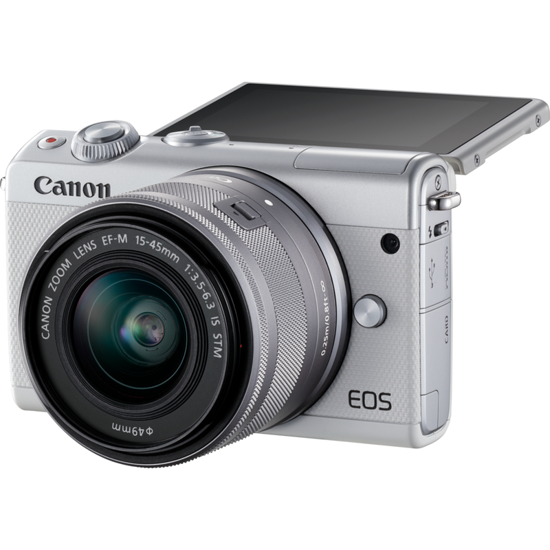 Canon EOS M100 Weiß + EF-M 15-45mm f/3.5-6.3 IS STM Objektiv Silber Produkt Diagonale Ansicht mit klappbarem Display