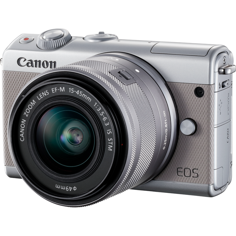 Canon EOS M100 Grau + EF-M 15-45mm f/3.5-6.3 IS STM Objektiv Silber Produkt Diagonale Ansicht mit internem Blitz