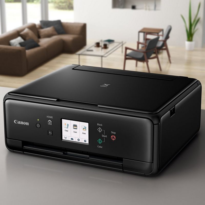 Canon PIXMA TS6150 – Schwarz Auf einem Tisch in einem Haus