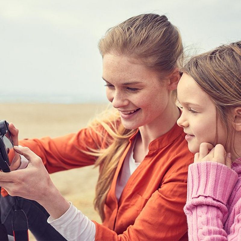 Team members with hands in circle_GettyImages-837737106