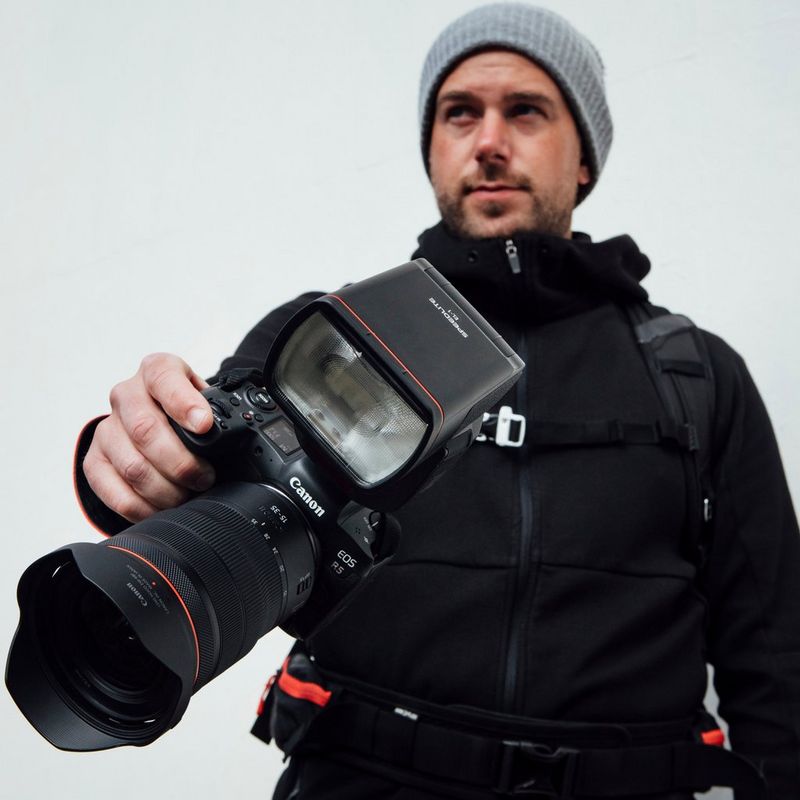 Canon Speedlite EL-1 Flash 0 Man with camera and flash attached