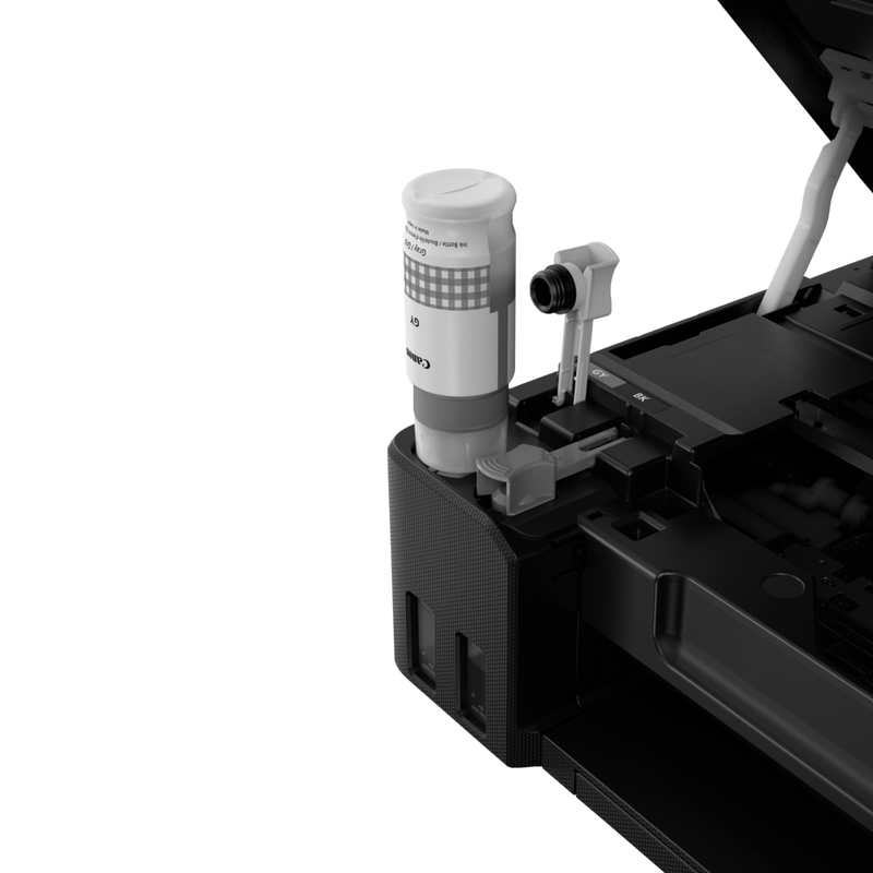 Canon PIXMA G650 Wireless 3-in-1 Refillable MegaTank Inkjet Photo Printer Product With Black Ink Being Refilled