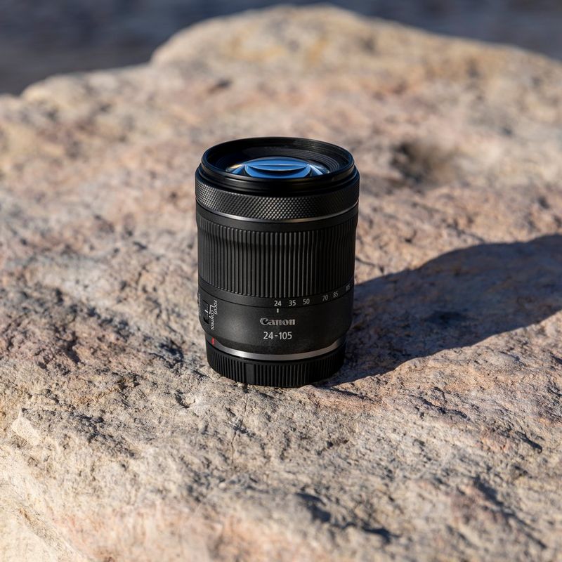 Canon EOS R8 Mirrorless Camera + RF 24-105mm F4-7.1 IS STM Lens Lens placed on a rock