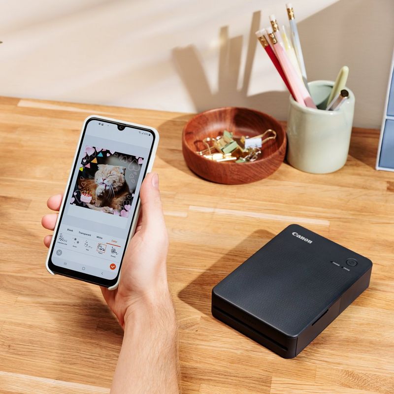 Canon SELPHY QX20 mobiler WLAN-Farbfotodrucker, Dunkelgrau Produkt mit Darstellung der Verbindung zum Smartphone