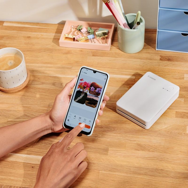 Canon SELPHY QX20 mobiler WLAN-Farbfotodrucker, Sandweiß Produkt mit Darstellung der Verbindung zum Smartphone