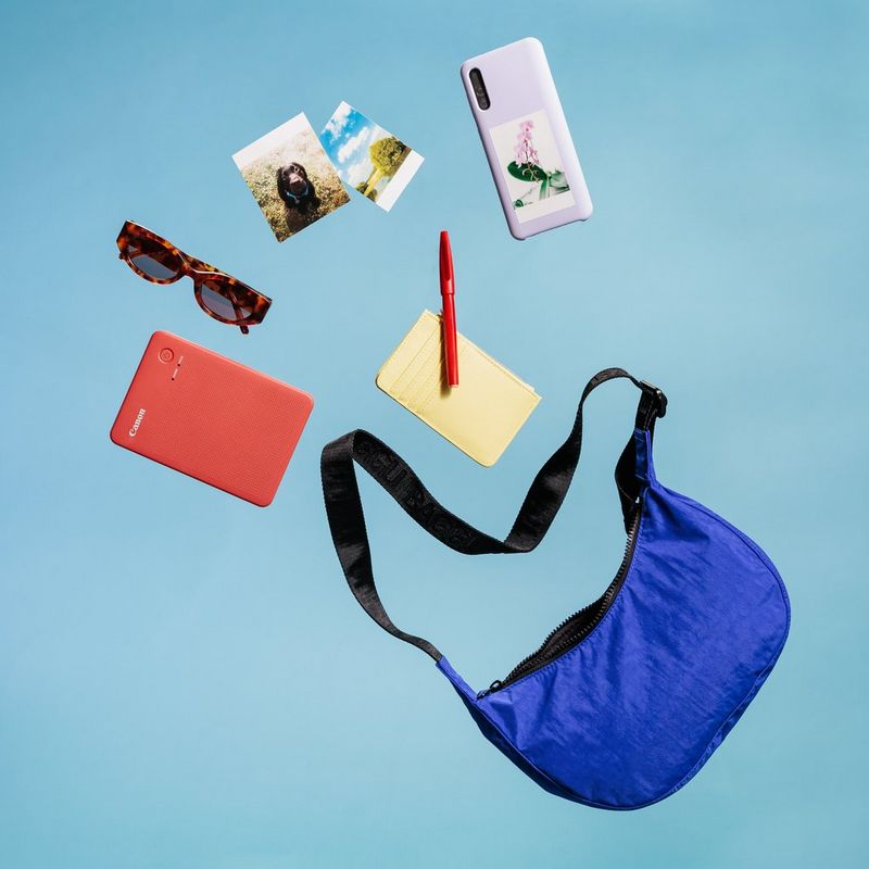 Canon SELPHY QX20 mobiler WLAN-Farbfotodrucker, Terrakottarot Produkt mit Darstellung der einfachen Mitnahme