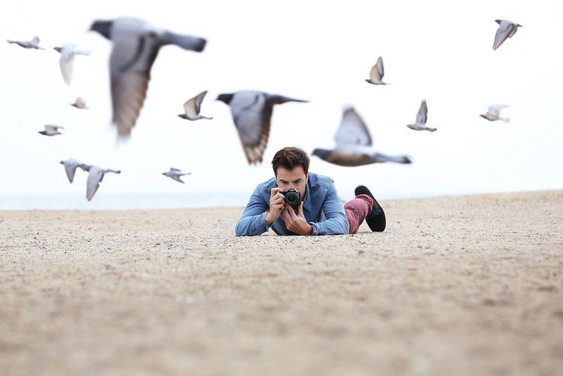 Canon PowerShot SX530 HS Mann beim Aufnehmen eines Fotos