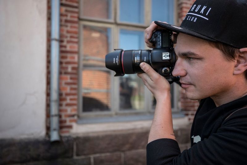 Photographer with Canon camera