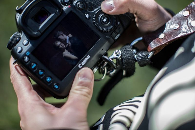 Photographer looking at in camera