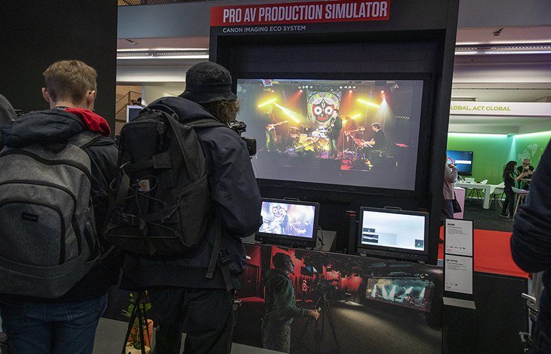 Young people playing with our camera and projector solutions