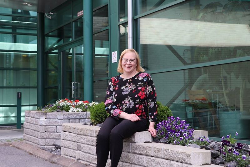 Female employee outside the office