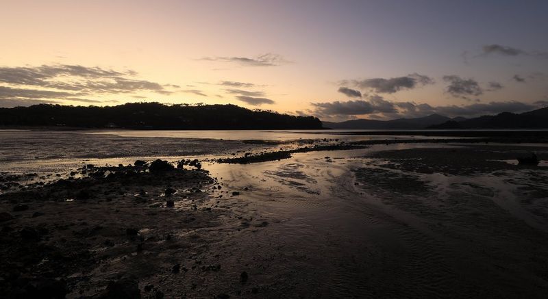 Sunset at the beach with a bright sky