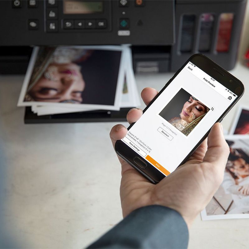 Lady scanning image with Canon PRINT app