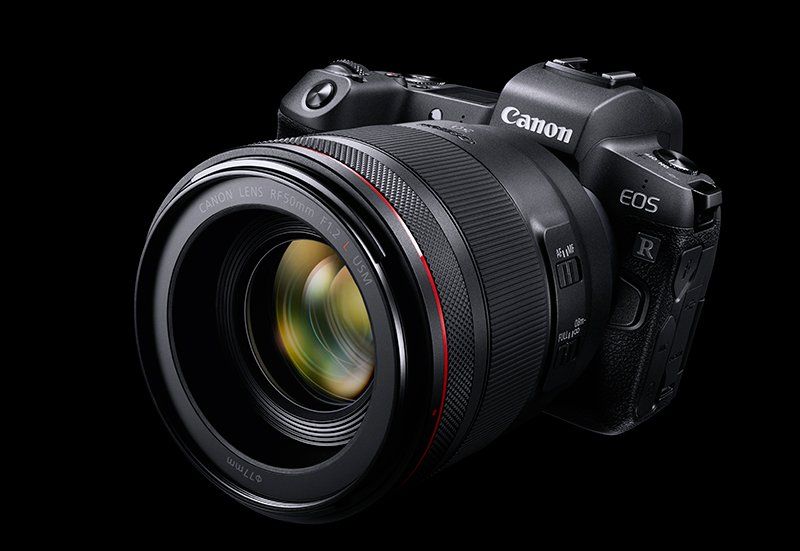 A scenic image of the silhouette of a person in the foreground with a space scene in full colour in the background