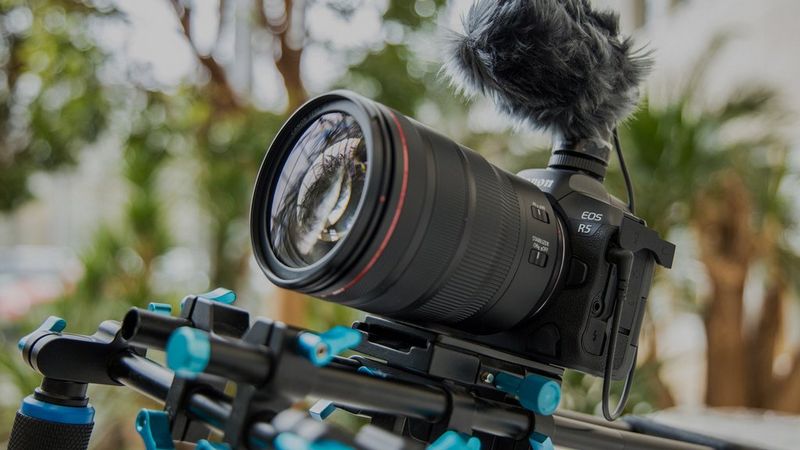 EOS R5 camera with RF 24-70mm F2.8L IS USM lens and microphone