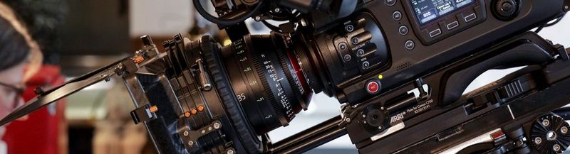 A Canon broadcast camera, poised for filming