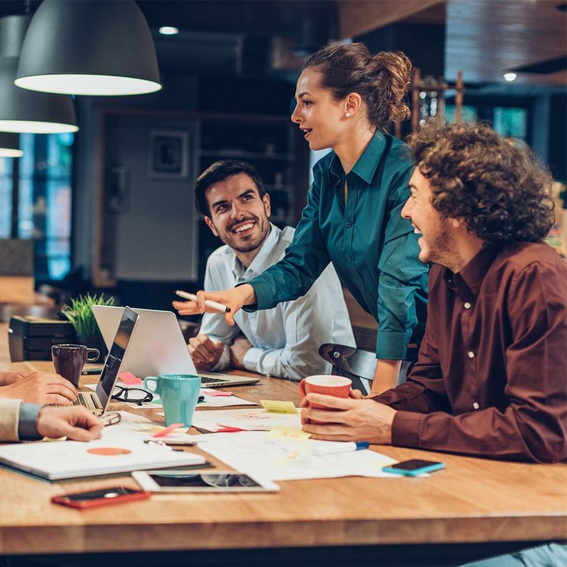 Standing woman leads meeting