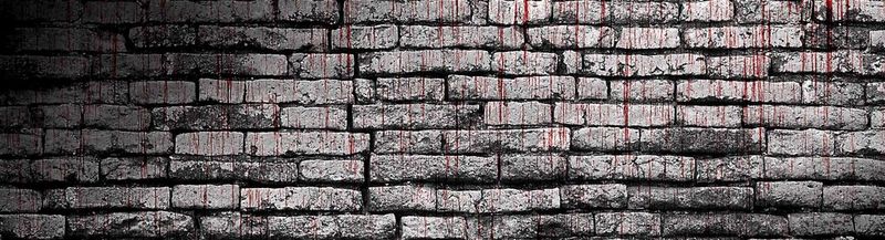 An old grey brick wall, with red blood dripping down it.