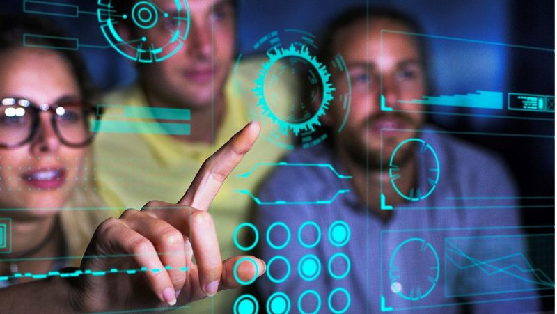 Colleagues using interactive screen