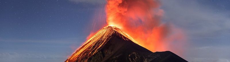 Volcano Fuego spits ash and red-hot lava into the sky.