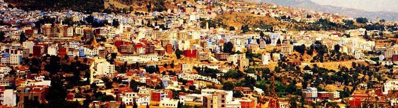 A colourful town on a hillside