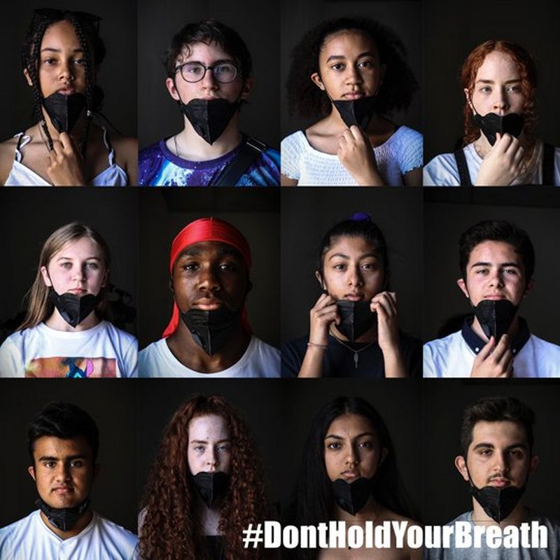 Twelve young people, against black backgrounds, all wearing masks to cover their mouths and noses, with a caption of #dontholdyourbreath