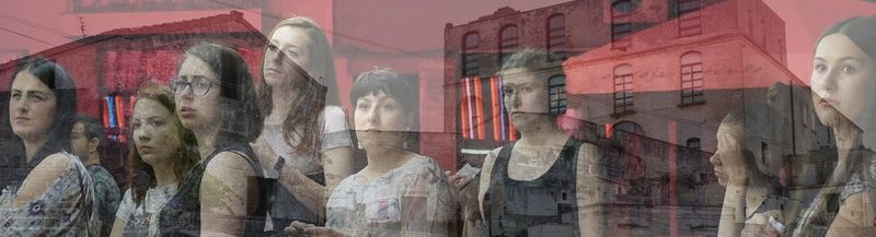 A group of young women, reflected in glass (© Rossena Petcova)
