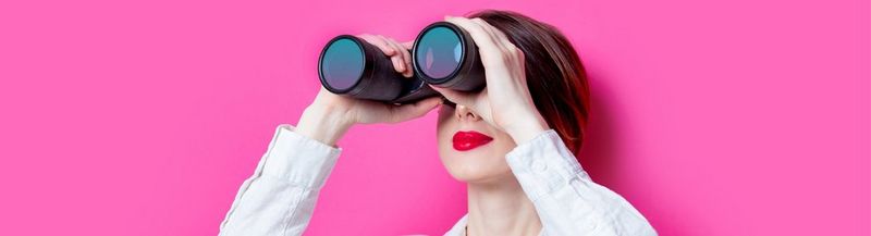 Black letters on a pink background saying “you here”