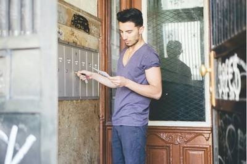 Promotional direct mail sitting on a printer