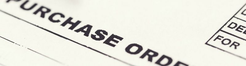 A form with ‘PURCHASE ORDER’ printed across it.