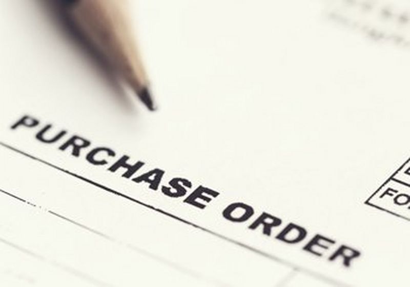 A form with ‘PURCHASE ORDER’ printed across it.