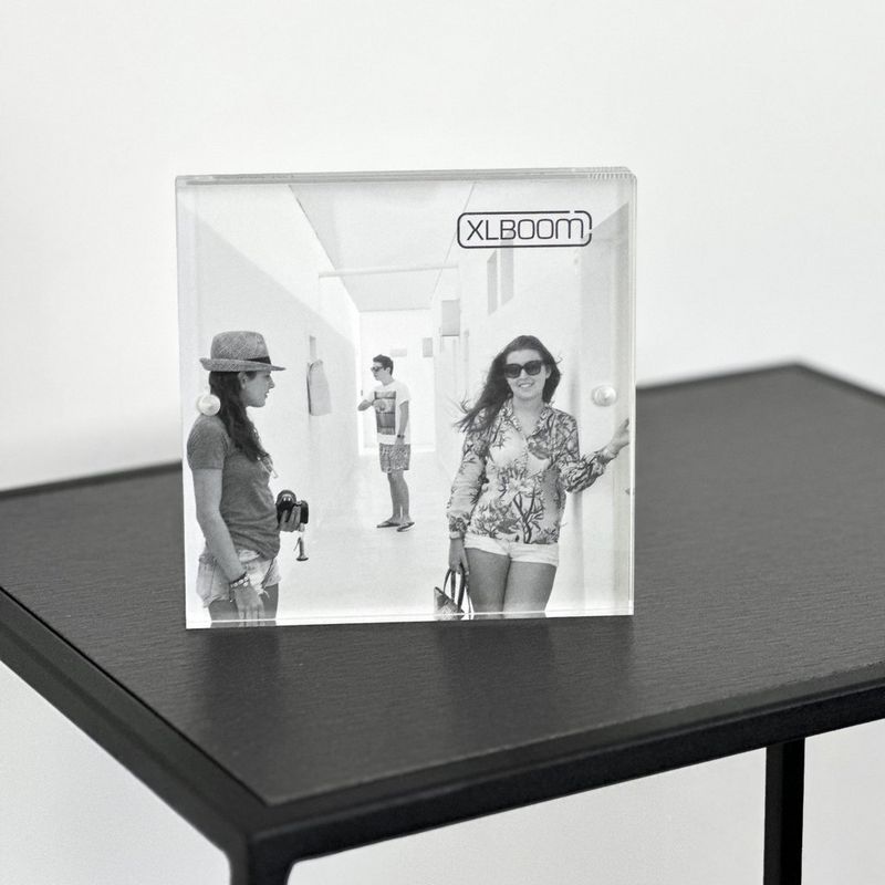 Canon Photo Cube and Frame + PP-201 5x5” Photo Paper Plus Glossy II (40 sheets) - Creative Pack, Orange Product photo frame kept on a table