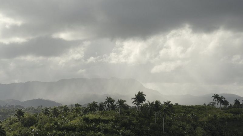A rain storm approaching the Yunque Mountain at Baracoa in Cuba.