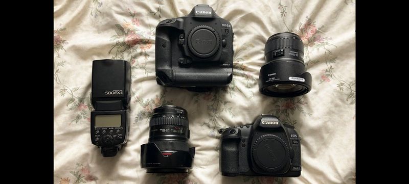 The contents of Wanda Martin’s kitbag on a sheet, including a Canon EOS-1D X Mark III.