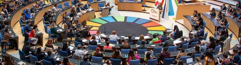 Attendees of the United Nations Global Festival of Action listen to event speakers