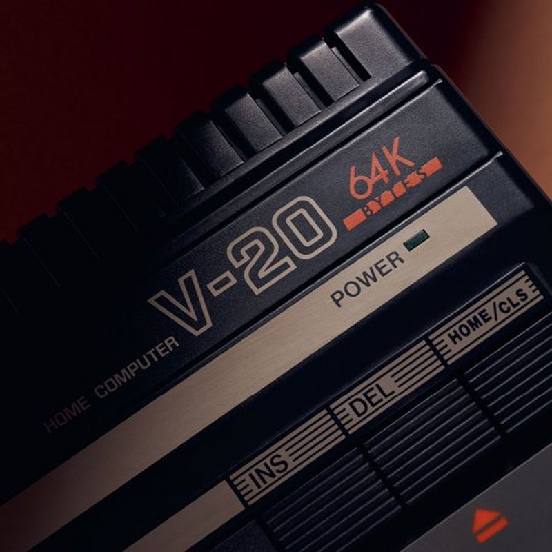 A close up of the Canon V-20 home computer, showing the text ‘HOME COMPUTER V-20 65K’, the power indicator and F keys.