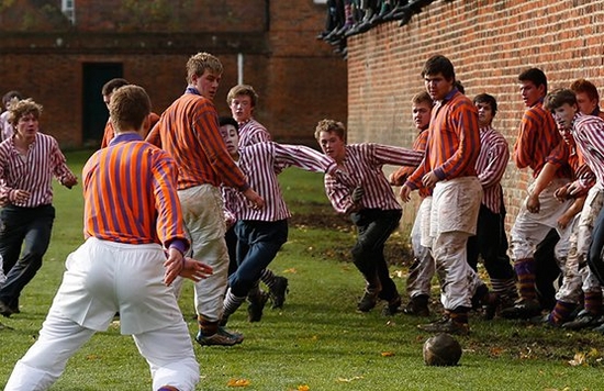 young men play Eton wall game