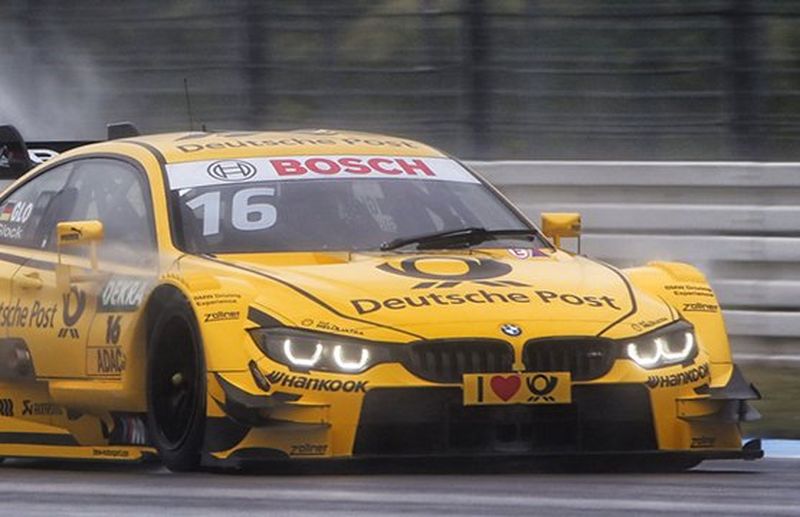 motor car driving on track