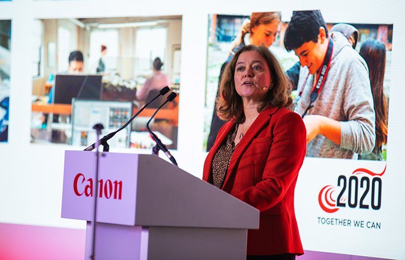 Caroline Price speaking at a Canon event