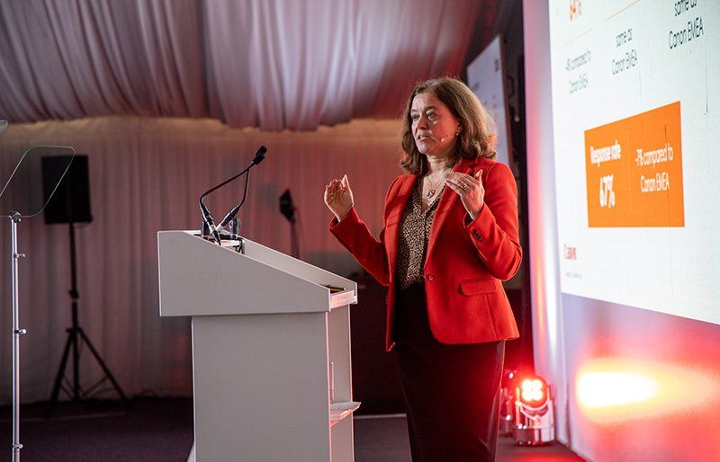 Caroline Price speaking at a Canon event