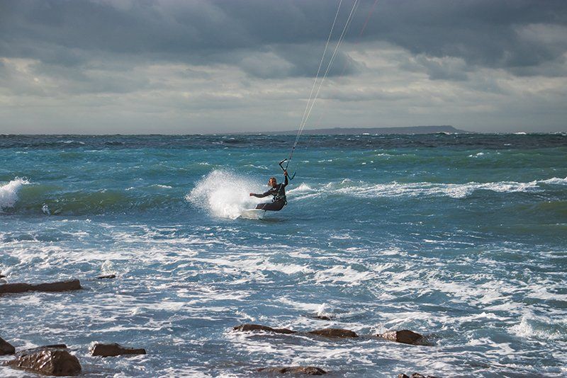 wide shot of kitesurfer