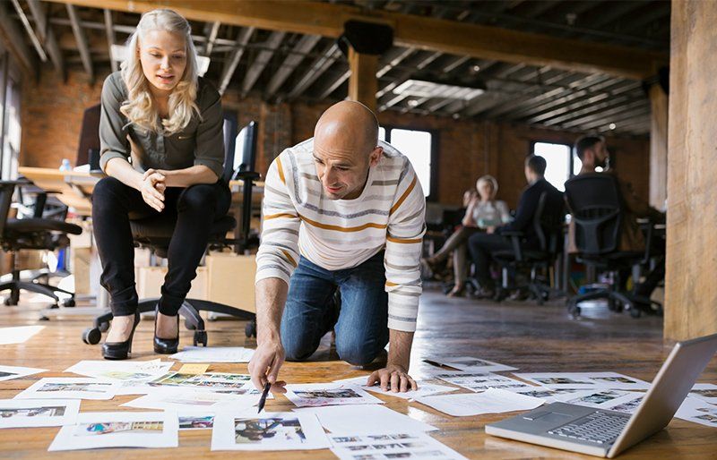 Team discuss proofs for digitally printed content