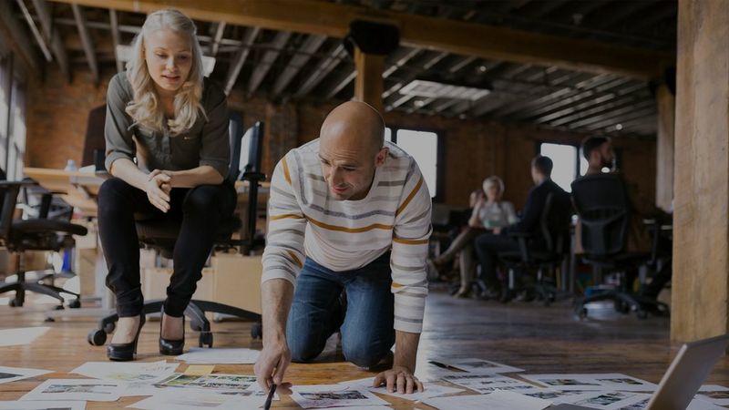 Team discuss proofs for digitally printed content