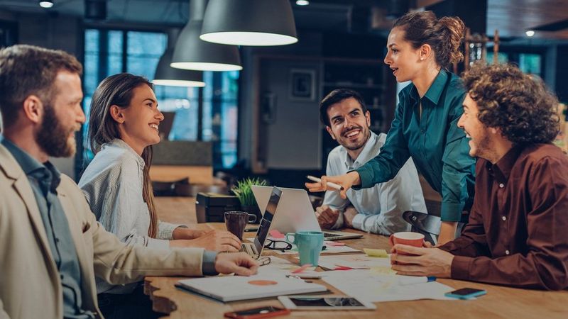 Workgrop around an office meeting table