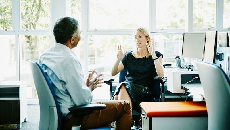 Business woman discussing her print requirements