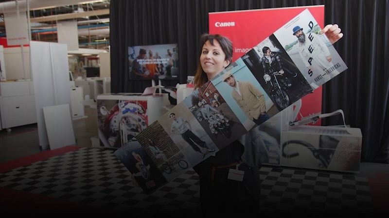 Sara Milani holds up a leporello print
