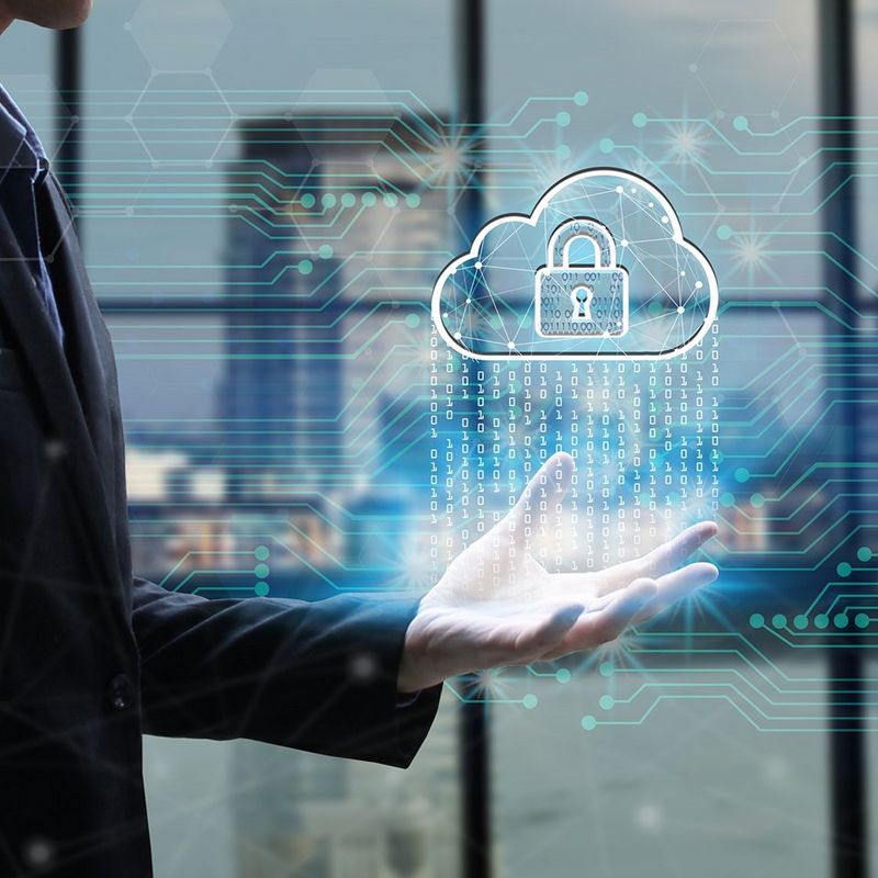 Digital-composit-image-of-businessman-with-cloud