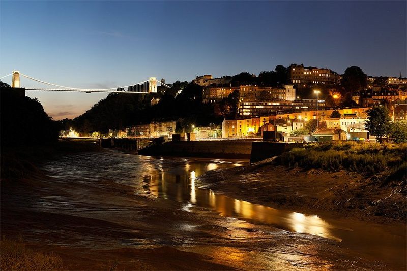 A high-resolution 'stitched' image looking down the Avon Gorge towards Bristol's Clifton Suspension Bridge at night.