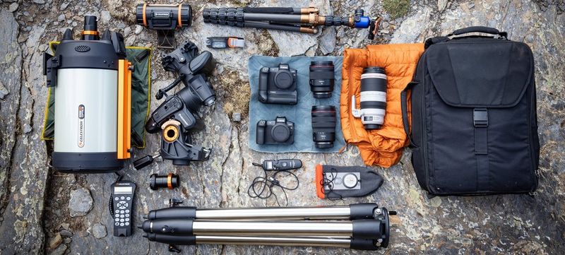 Fergus Kennedy's photography kit is laid out, including a Canon EOS Ra.