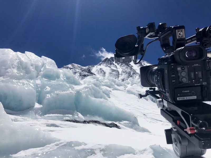 A Canon EOS C200 camera in front of ice and snow at Mount Everest's South Base Camp in Nepal. 